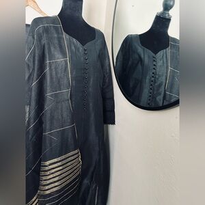 Elegant Black Dress with Gold Accents